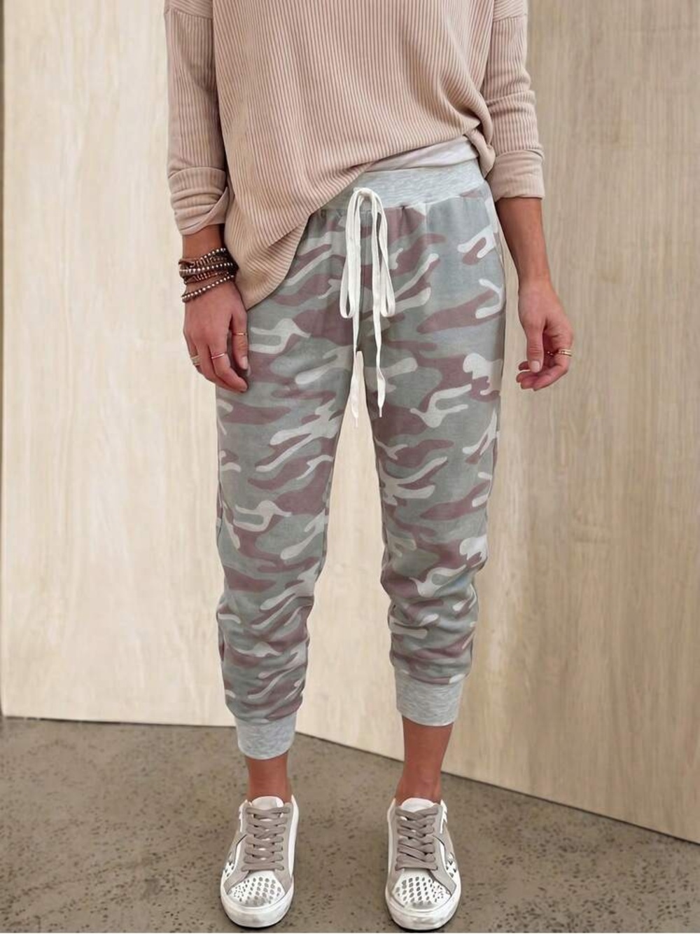 Women's Camouflage Drawstring Joggers in Light grey, green and purple.
